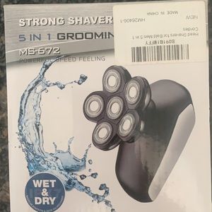 5 in 1 Grooming Kit. Never used. Open box.